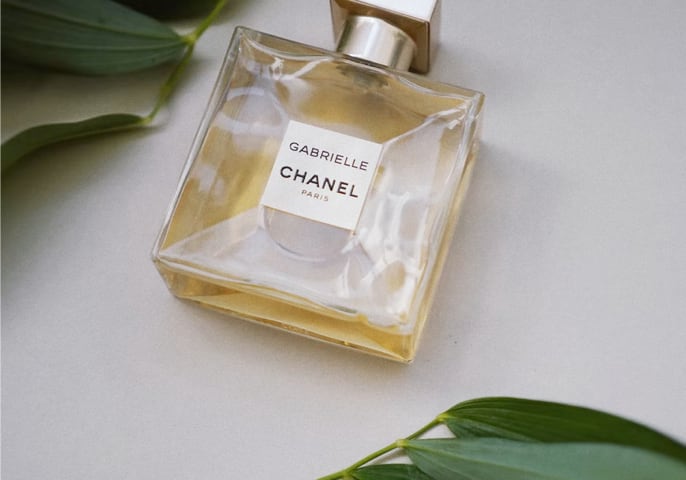 Chanel perfume in an elegant glass container.